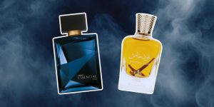 Montagem com frascos de dois perfumes masculinos que são bombas em frente a um fundo azul escuro com névoa branca